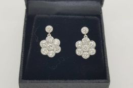 Pair Of Diamond Daisy Cluster Drop Earrings, bezel set brilliant cut diamonds, centre diamond is