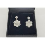 Pair Of Diamond Daisy Cluster Drop Earrings, bezel set brilliant cut diamonds, centre diamond is