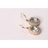 Pair of Natural Aquamarine & Diamond Earrings, set with 2 oval cut aquamarines totalling 1.05ct,