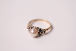 Pearl and Sapphire ring, central 6.5mm pearl with sapphire set shoulders, hallmarked 9ct, circa