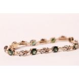 9CT GREEN STONE AND DIAMOND FANCY BRACELET, total weight 9.6gms, length 17cms.