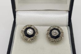 Pair of Art Deco Onyx & Diamond Earrings, with open flower scroll butterfly backs, white gold.