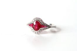 Platinum Ruby and Diamond Art Deco style ring, feature oval cut ruby, set with ruby shoulders,