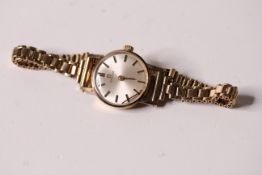 LADIES 9CT OMEGA DRESS WATCH, circular dial, baton hour markers, 9ct bracelet, manual wind, a/f