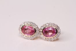 Pair of Natural Pink Sapphire & Diamond Earrings, set with 2 oval cut pink sapphires totalling 1.