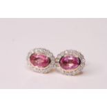 Pair of Natural Pink Sapphire & Diamond Earrings, set with 2 oval cut pink sapphires totalling 1.