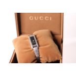 LADIES GUCCI WATCH REFERENCE 109, rectangular black dial, stainless steel case and bracelet, with