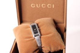 LADIES GUCCI WATCH REFERENCE 109, rectangular black dial, stainless steel case and bracelet, with