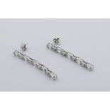 Pair Of Long Diamond Drop Earrings, set with baguette and round brilliant cut diamonds, no weights