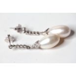 Pearl and diamond drop earrings, large tear drop pearls, approx 21x11mm suspended from brilliant cut