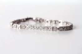 18ct Diamond Bracelet, Art Deco style, 18.5cm long, estimated total diamond weight 1.50ct+,