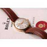 VINTAGE 9CT TUDOR ROYAL WRISTWATCH REFERENCE 12856 / 7002 WITH PAPERS, silvered dial, gilt baton