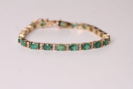 Natural Emerald & Diamond Bracelet, set with 21 oval cut emeralds totalling 8.13ct, 42 round