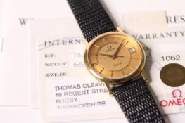 18CT OMEGA DE VILLE 1999 WITH PAPERS, circular gold dial with engine turned design, Roman