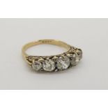 Victorian 5 Stone Diamond Ring, in ornate scroll setting, stamped 18ct yellow gold, approximate
