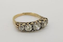 Victorian 5 Stone Diamond Ring, in ornate scroll setting, stamped 18ct yellow gold, approximate