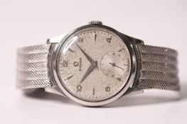 VINTAGE 1950S OMEGA , grey dial, silver dagger and Arabic numeral hour markers, subsidiary seconds