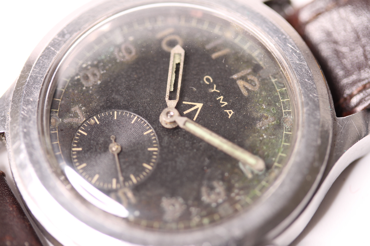 DIRTY DOZEN MILITARY CYMA 1940S WRISTWATCH, circular black dial, untouched, Arabic luminous hour - Image 7 of 8