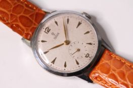 VINTAGE TUDOR DRESS WATCH CIRCA 1960S, circular cream dial, gold dagger hour markers, subsidiary