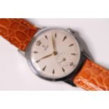 VINTAGE TUDOR DRESS WATCH CIRCA 1960S, circular cream dial, gold dagger hour markers, subsidiary