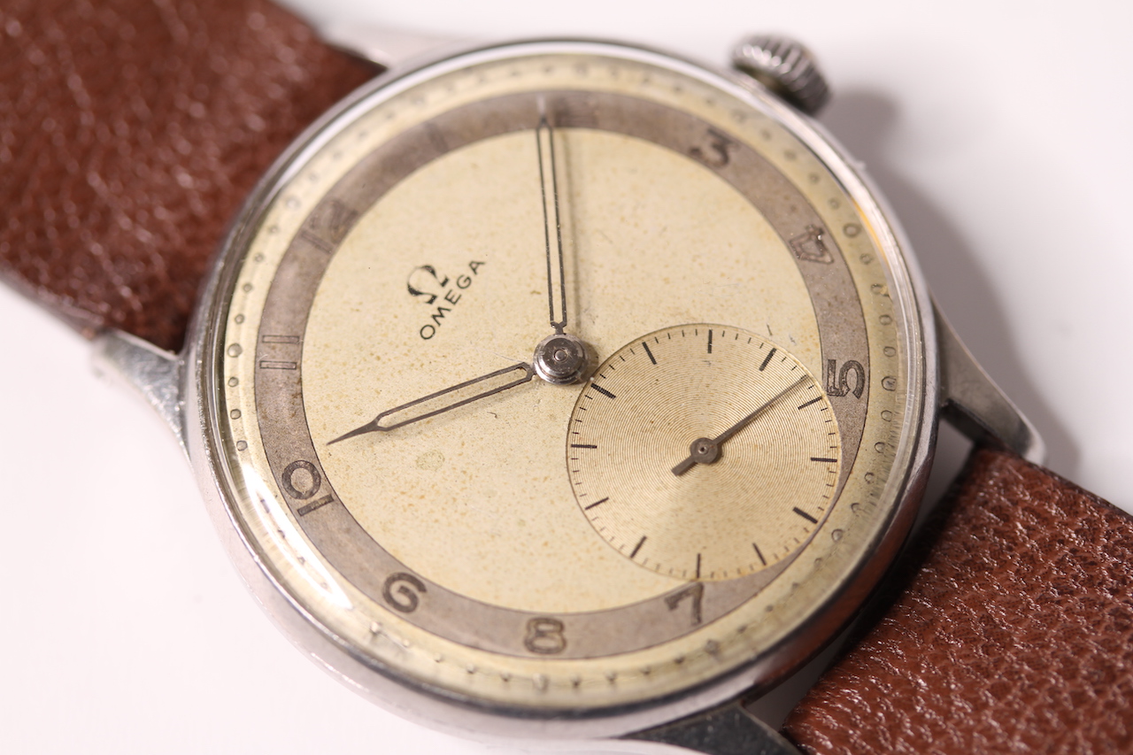 VINTAGE OMEGA 30T2 WRIST WATCH REFERENCE 2317 15, two tone dial, Arabic  numerals, outer minute dot