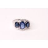 Natural Sapphire & Diamond Ring, set with 3 oval cut sapphires totalling 4.17ct, 32 round