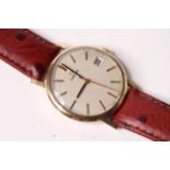 VINTAGE 9ct OMEGA DRESS WATCH, circular cream dial, gilt and black baton hour markers, date