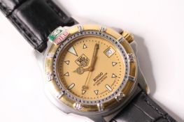 VINTAGE TAG HEUER 200 PROFESSIONAL BI COLOUR REFERENCE 995.406K, gilt dial, luminous hour markers,