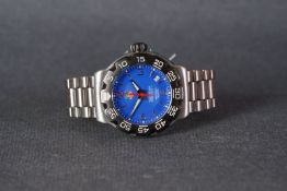 GENTLEMENS TAG HEUER FORMULA 1 DATE WRISTWATCH, circular blue dial with silver hour markers and