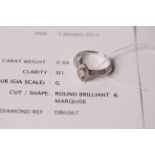Diamond Cluster Ring, set with a central marquise cut diamond, surrounded by round brilliant cut