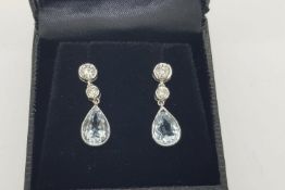 Pair Of Pear Shaped Aquamarine & Diamond Earrings, bezel set aquamarines suspended on a double