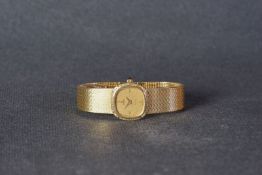 LADIES OMEGA DE VILLE 18CT GOLD DIAMOND SET WRISTWATCH, rounded gold linen dial with hour markers