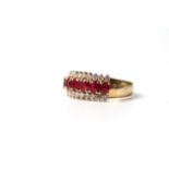 Ruby and diamond ring, 6 rubies set with a border of diamonds, estimated rubie weight 1.20ct,