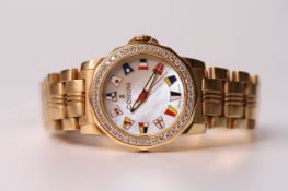 18CT LADIES CORUM ADMIRALS CUP REFERENCE 039.440.65, circular mother of pearl dial, nautical flag