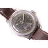 DIRTY DOZEN MILITARY CYMA 1940S WRISTWATCH, circular black dial, untouched, Arabic luminous hour