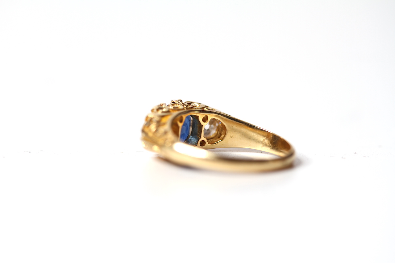 Early 20th Century Sapphire and Old Cut Diamond Three Stone Ring, central sapphire, estimated 1. - Image 2 of 2