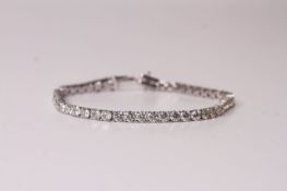 Diamond Tennis Bracelet, set with 48 round brilliant cut diamonds totalling 7.20ct, 14k white