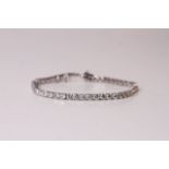 Diamond Tennis Bracelet, set with 48 round brilliant cut diamonds totalling 7.20ct, 14k white