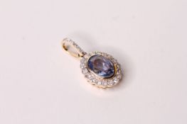 Natural Sapphire & Diamond Pendant, set with 1 oval cut sapphire 1.15ct, surrounded by 18 round