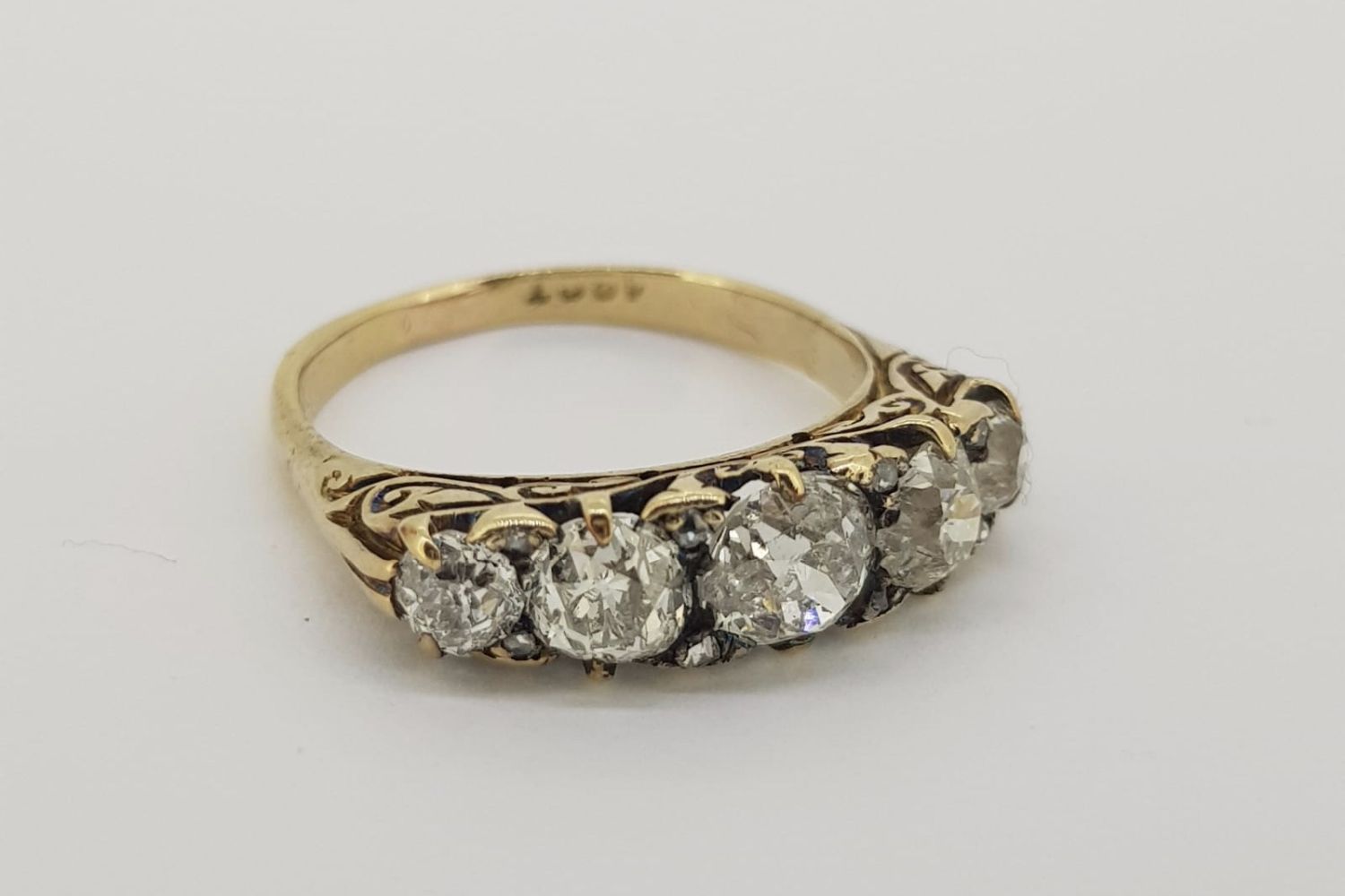 Victorian 5 Stone Diamond Ring, in ornate scroll setting, stamped 18ct yellow gold, approximate