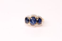 Natural Sapphire & Diamond Ring, set with 3 oval cut sapphires totalling 3.30ct, 32 round