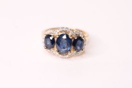 Natural Sapphire & Diamond Ring, set with 3 oval cut sapphires totalling 2.90ct, 32 round