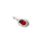 Natural Ruby & Diamond Pendant, set with1 oval cut natural ruby and 24 round brilliant cut diamonds,