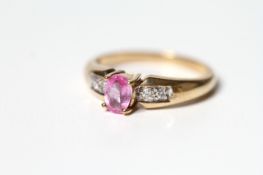 Pink sapphire and diamond ring in 9ct yellow gold