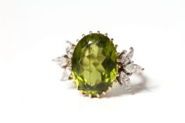 Peridot and Diamond Cocktail Ring, large oval cut peridot, approximately 16x12mm, with a trefoil