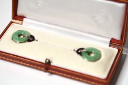 Art Deco Jade and Diamond Jabot Pin, a pair of natural Jade discs to each end, rose cut diamond