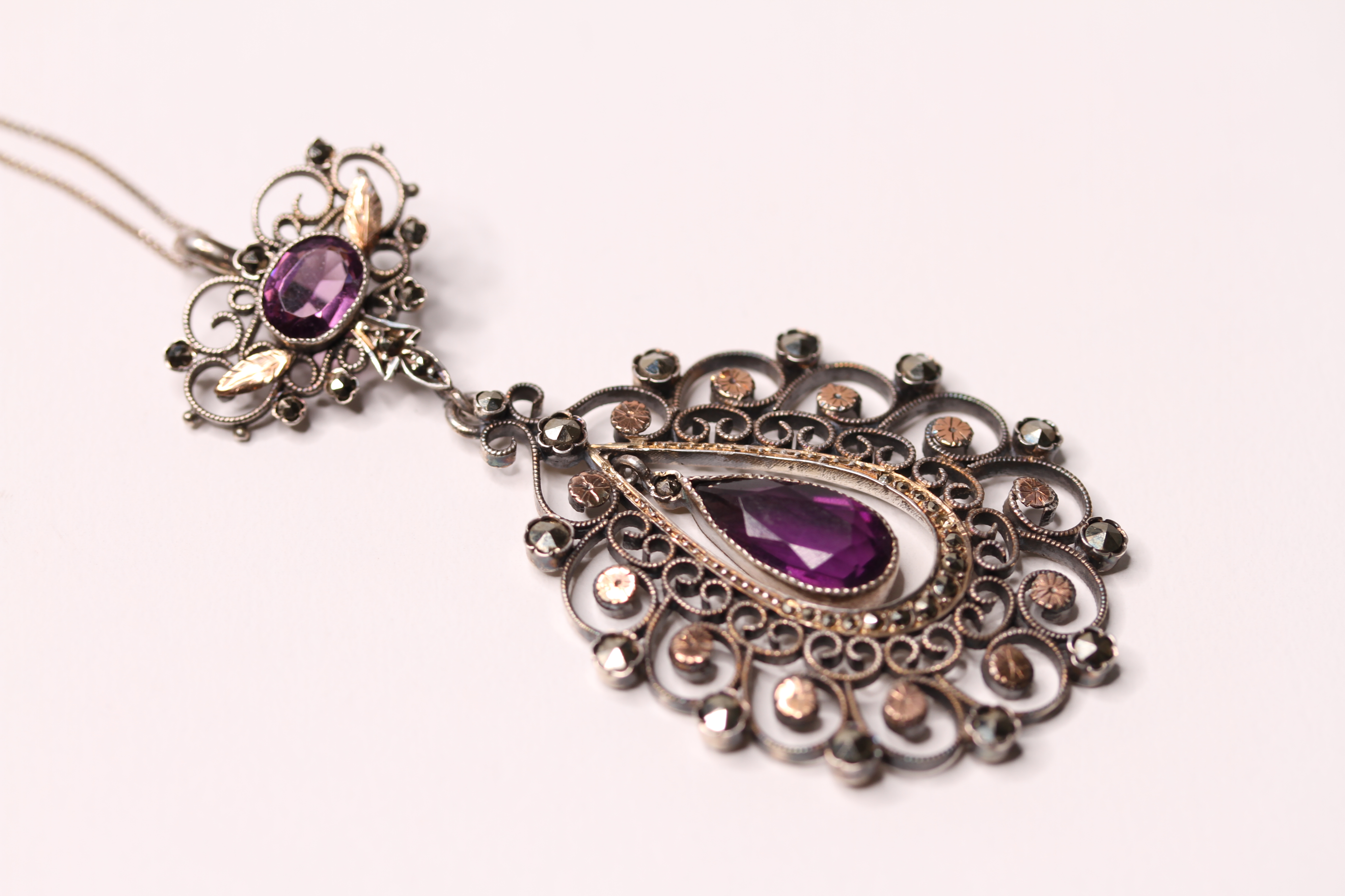 *TO BE SOLD WITHOUT RESERVE*An Antique unmarked silver amethyst and marcasite drop pendant, with