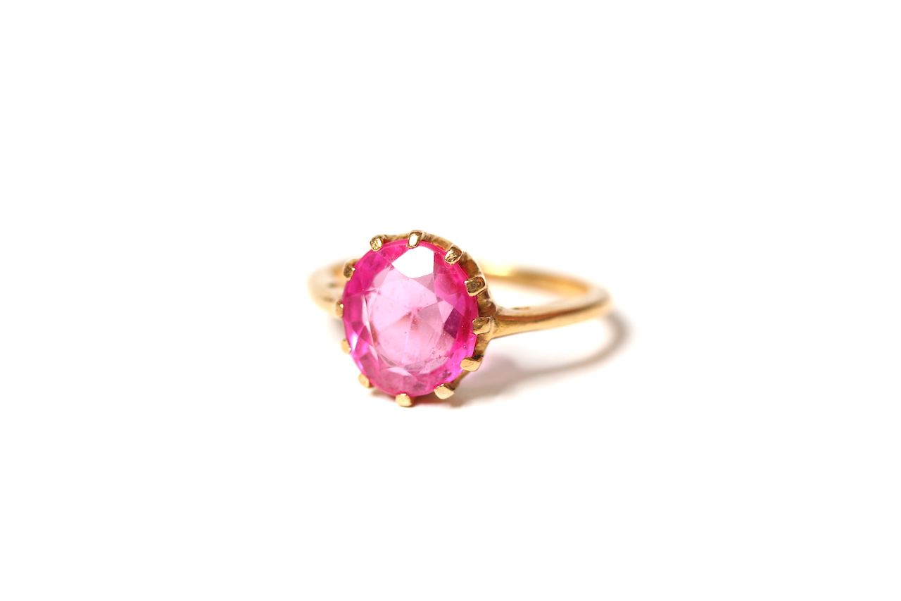 Pink Stone Dress Ring, single pink oval cut stone, claw set in yellow gold tested as 9ct or higher