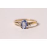 Natural Sapphire & Diamond Ring, set with 1 oval cut natural sapphire 0.90ct, 2 round brilliant