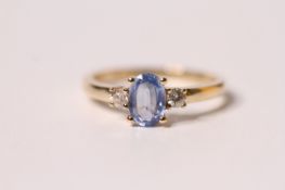 Natural Sapphire & Diamond Ring, set with 1 oval cut natural sapphire 0.90ct, 2 round brilliant